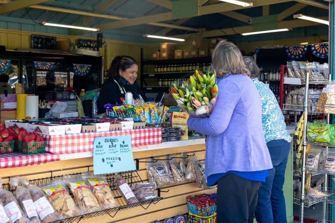 customers buying fresh produce at Hayashi Fruit Stand at Oceano