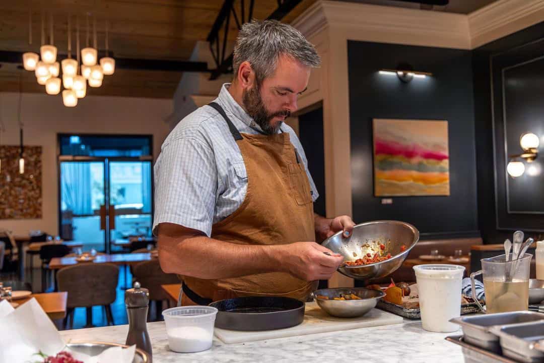 Brad Cecchi preparing seasonal specials at Canon