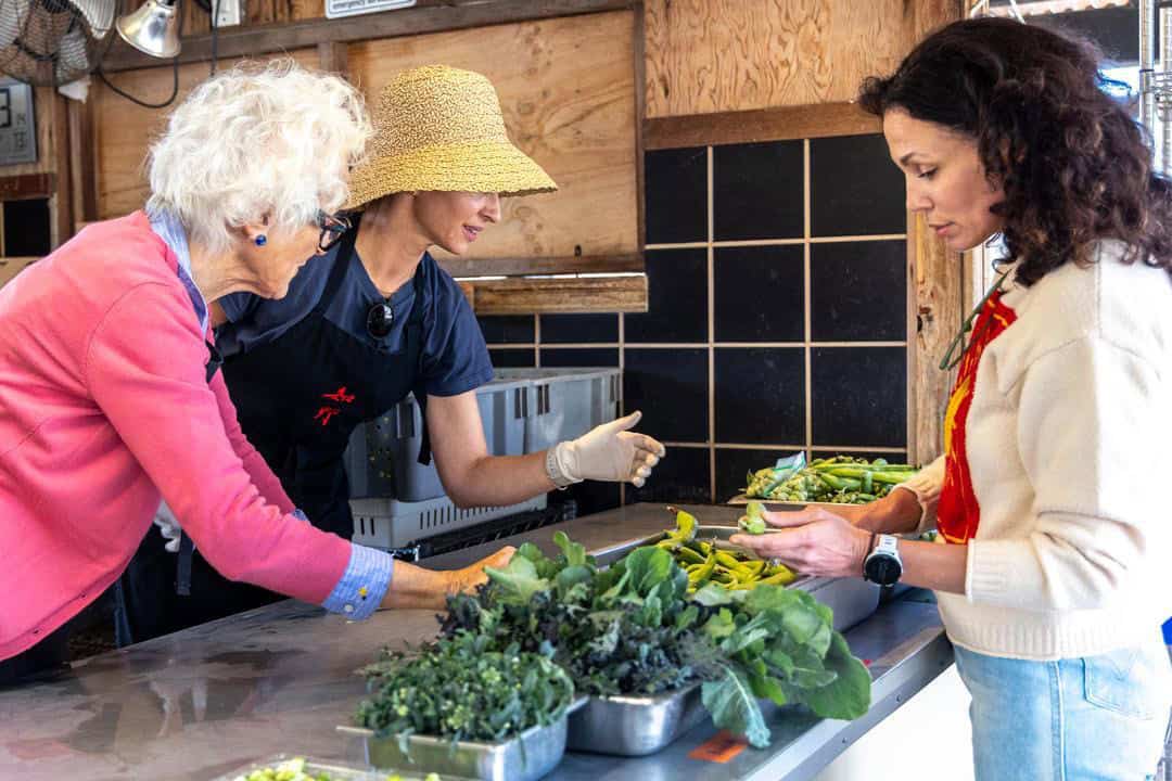 Aida Mollenkamp inspecting produce at Chino Family Farm