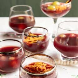 Glasses of red wine holiday punch.