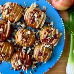 Apple hasselbacks with fennel, bacon, blue cheese, and thyme.