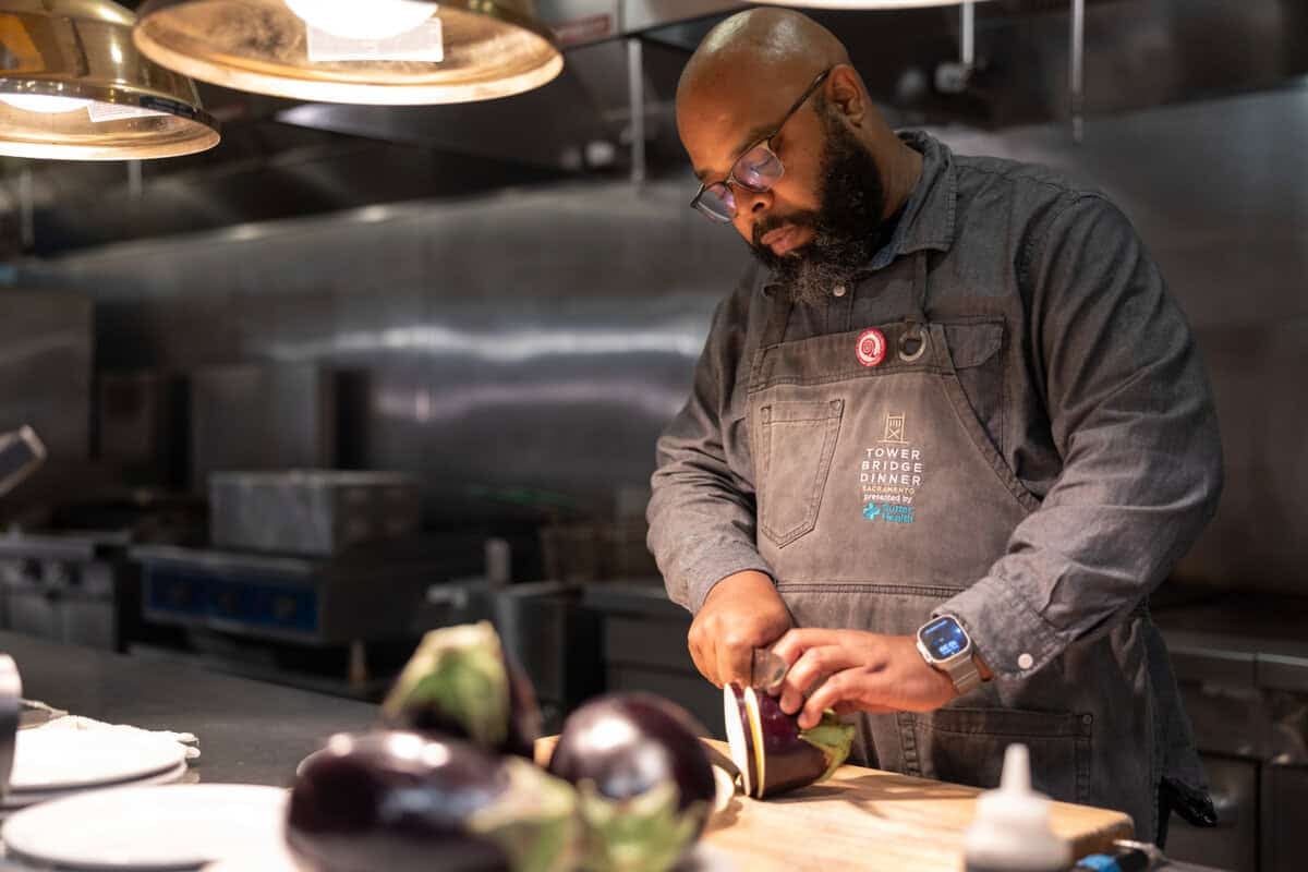 Chef Dennis prepping eggplant at Empress Tavern
