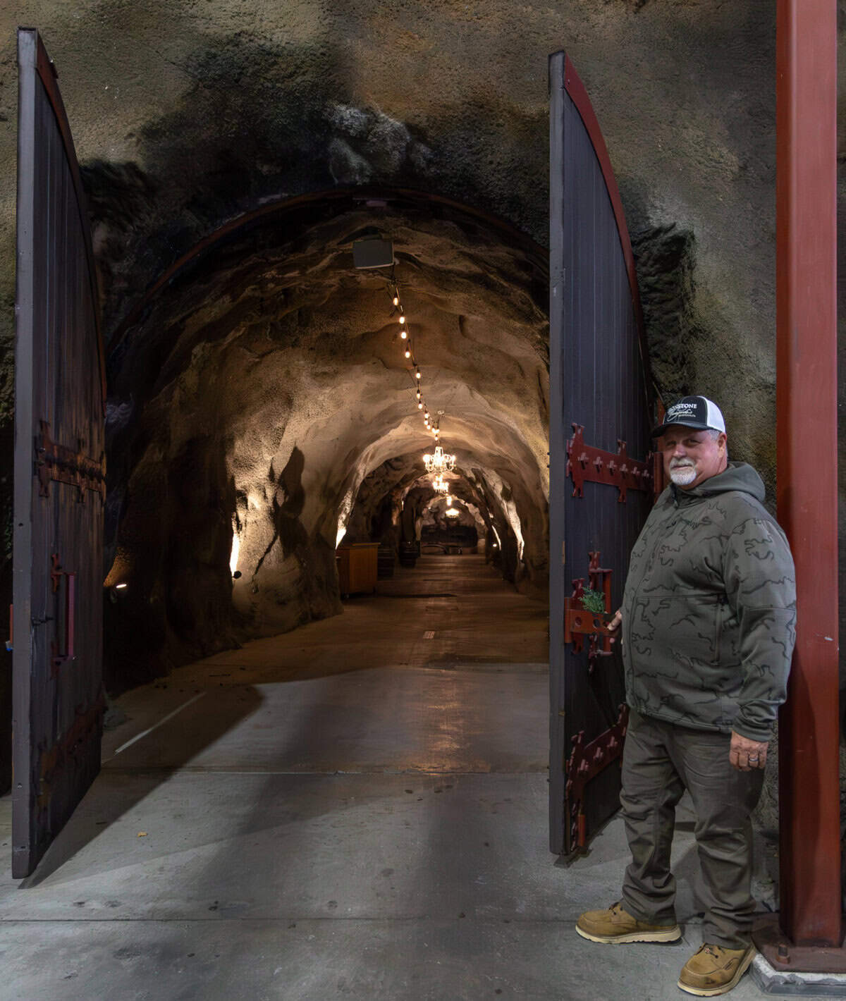 Stephen Kautz opening the door to the wine caves at Ironstone Vineyards