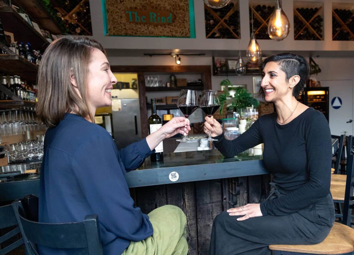 Nicole Salengo Lee enjoying a glass of wine with Sara Arbabian, owner of The Rind