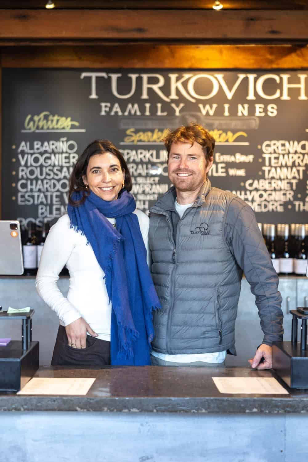 Chris and Luciana Turkovich behind the bar at Turkovich Family Winery