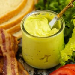 Zoomed in on a jar of avocado mayonnaise.