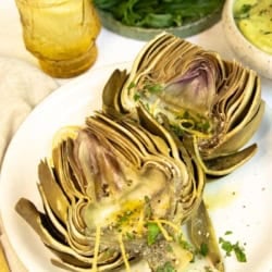 Plated Instant Pot artichokes.