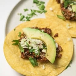 Delicious California Taco Blend tacos on a whit serving plate.