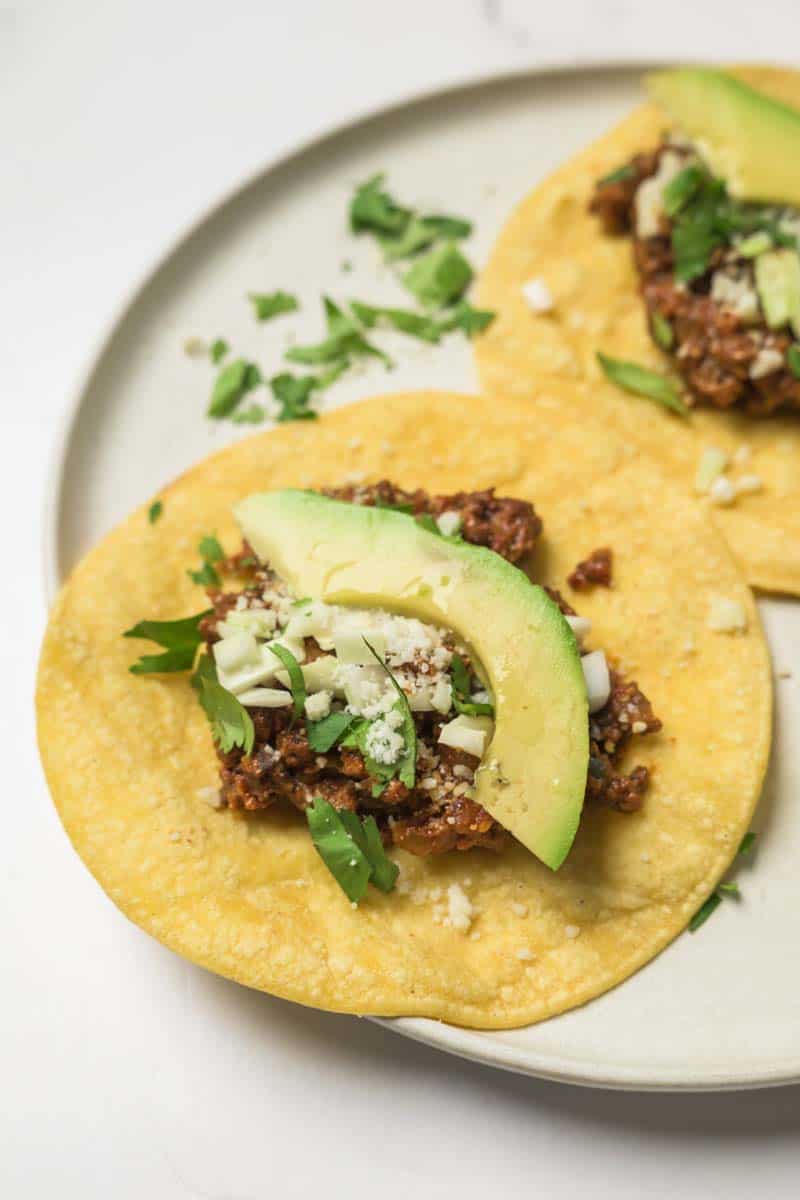 Delicious California Taco Blend tacos on a whit serving plate.