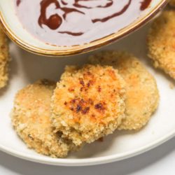 A close up of a veggie packed chicken nugget.