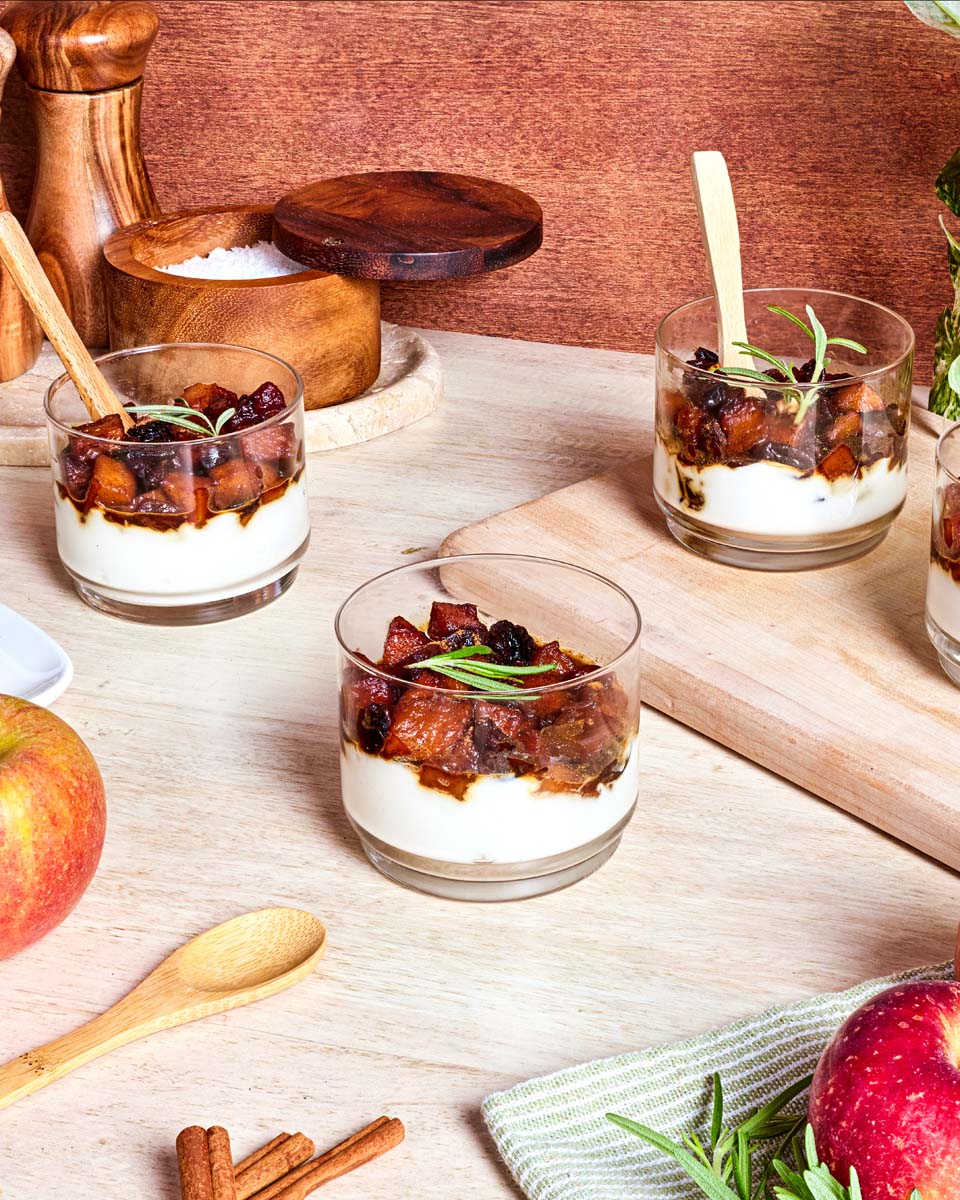 Multiple serving dishes of apple skillet.