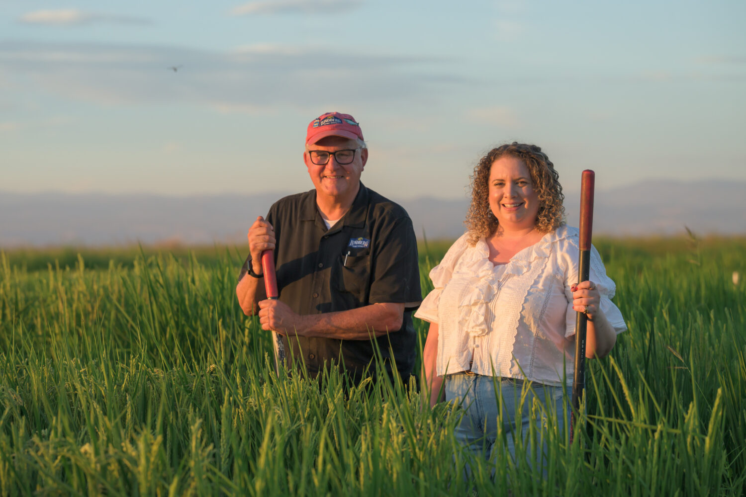 Brita Lundberg and her dad at Lundberg family farms