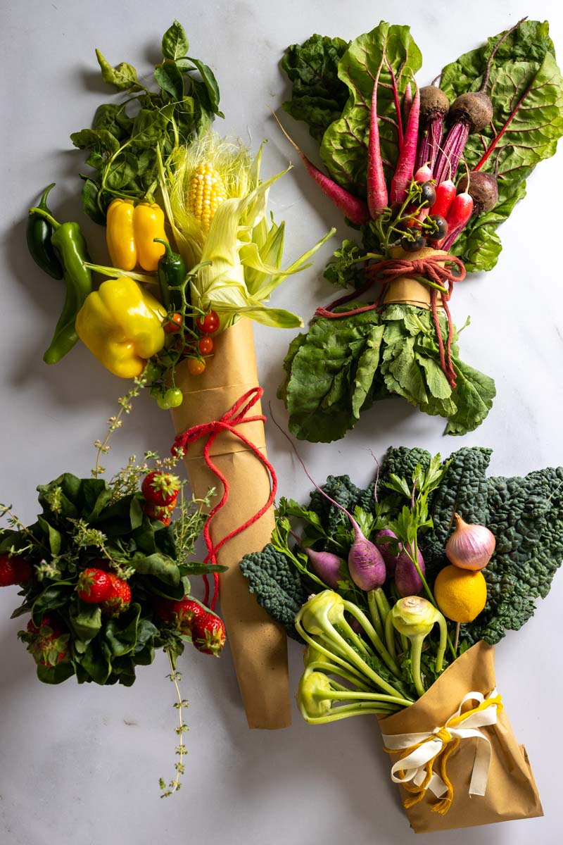 Four differnet sty;les of produce-inspired edible bouquet.