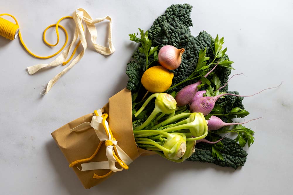 An edible bouquet ready to gift with yellow ribbon.