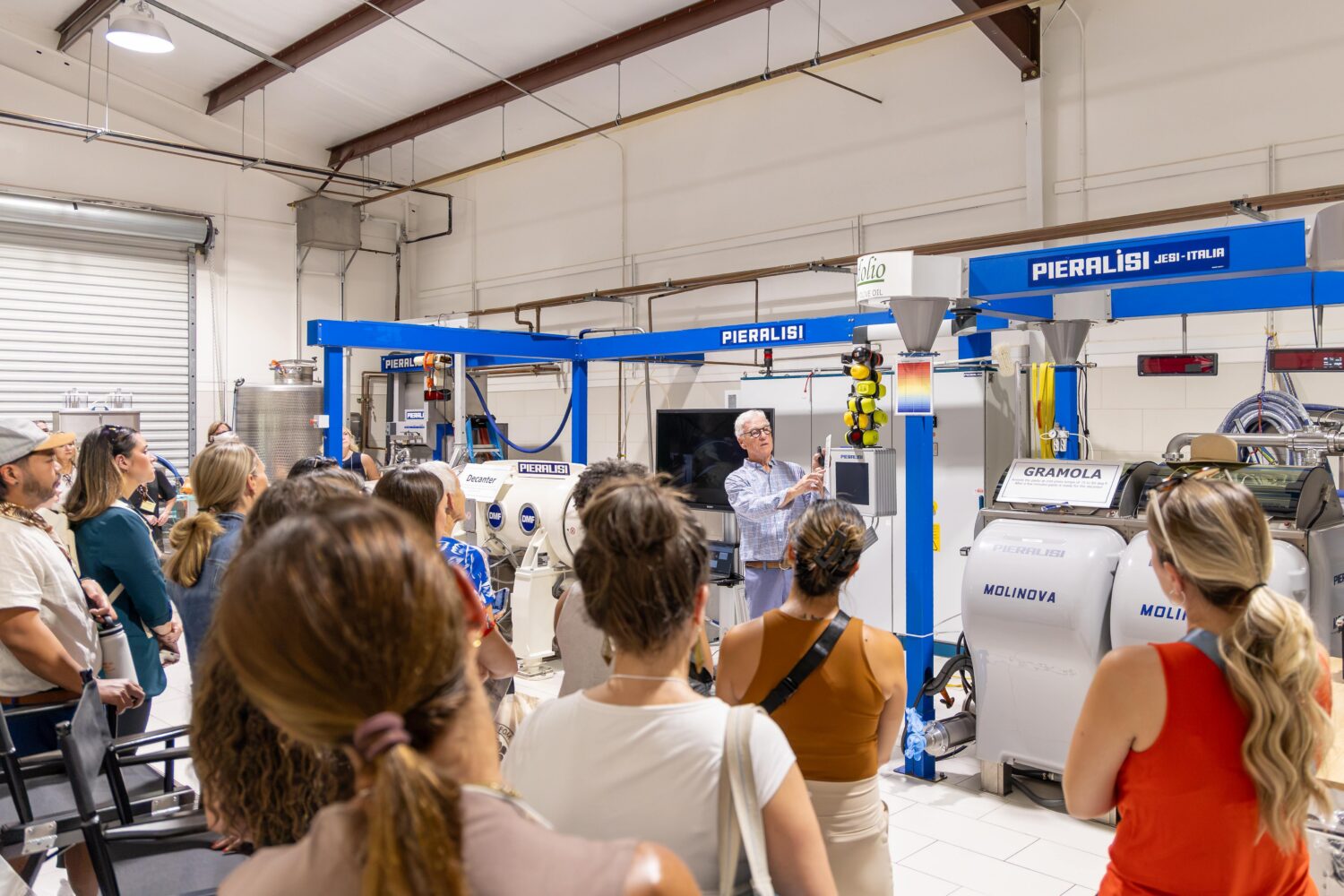 a group touring the mill with Malcolm Bond